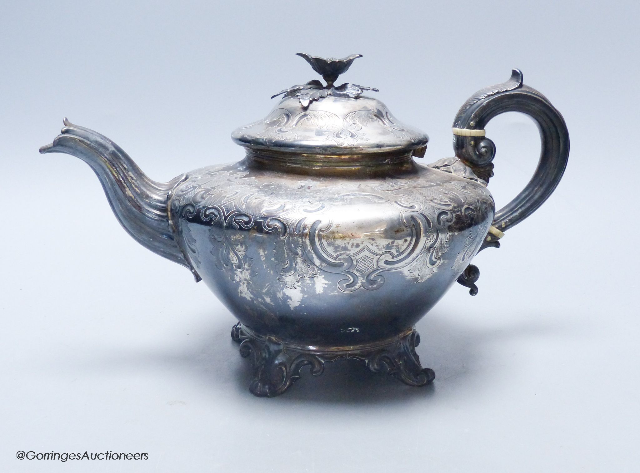 A late William IV embossed silver squat melon shaped teapot, by The Barnards, London, 1837, gross weight 24oz.